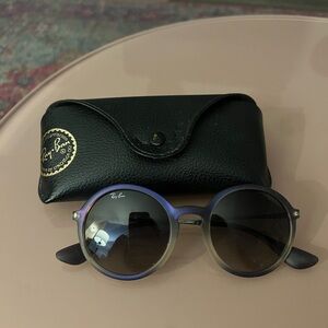 Super cute Ray-Bans! Purple/white rims. Comes with case.